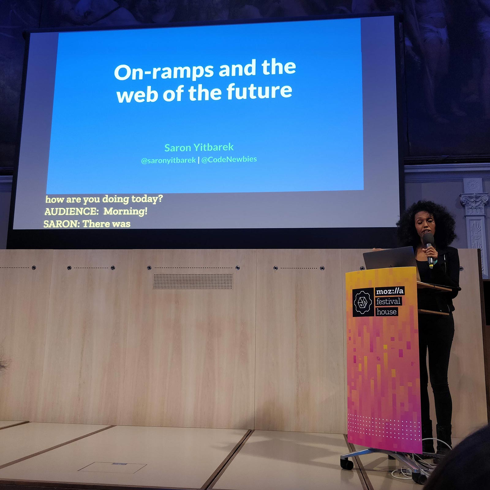 Saron Yitbarek giving a talk at View Source Conference